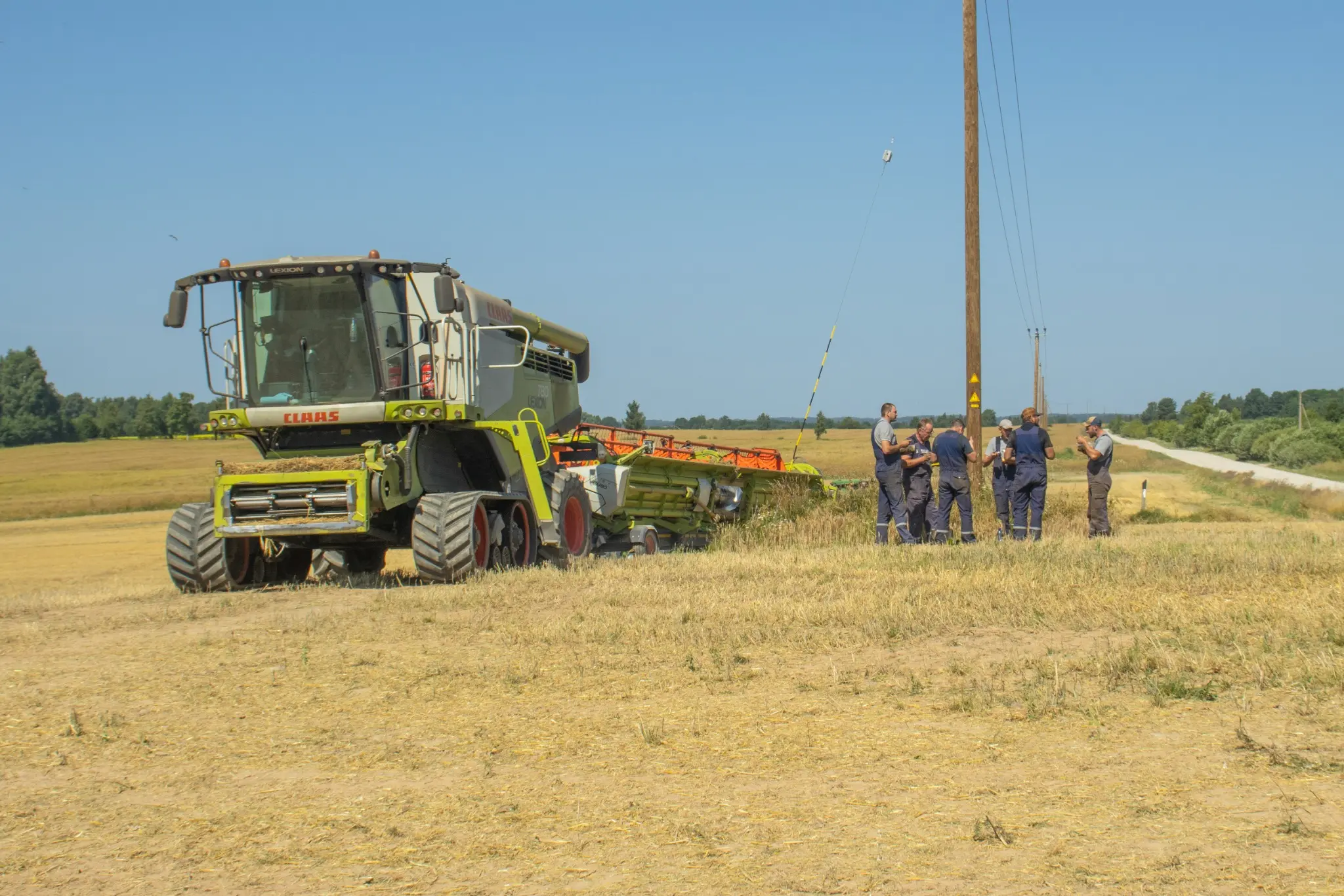 SIA Balticagrar komanda pie Claas kombaina